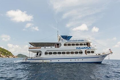 MV Pawara liveaboard boat at anchor, marked West Coast Divers on the hull