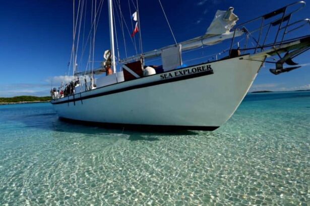 Sea Explorer sailboat anchored in shallow turquoise water off Blackbeard's Cruises in the Bahamas