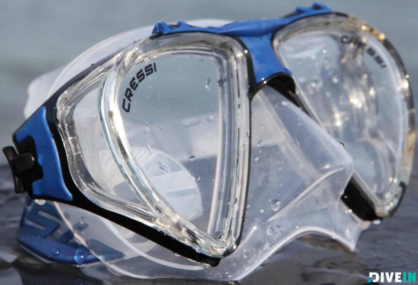 Cressi Penta+ Mask Side Window View Cressi Penta+ mask seen from the side, showing one of its side windows and the blue frame over the strap buckle