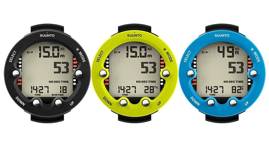 Three Suunto Zoop Novo dive computers in black, lime and blue, each showing depth, dive time and no-deco time