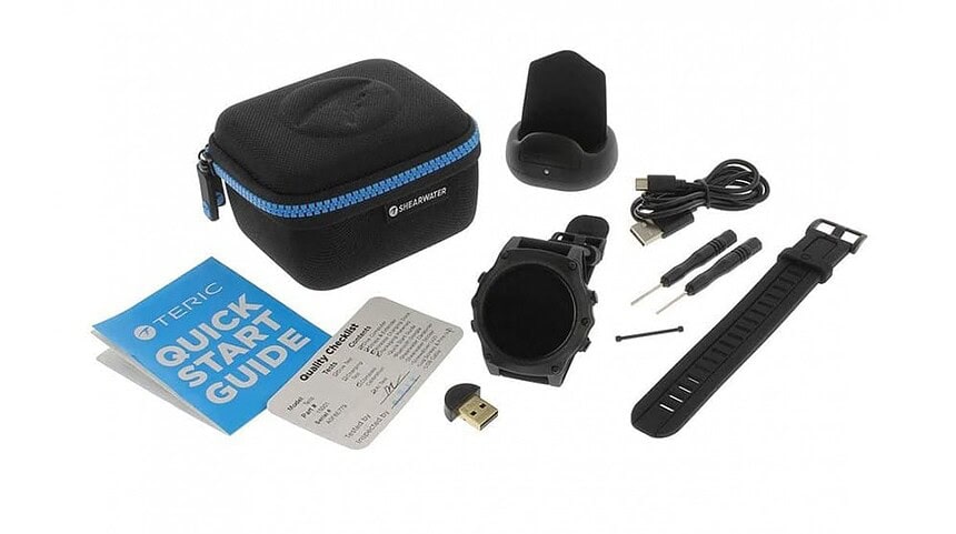 Shearwater Teric unboxed with hard case, charging dock, USB cable, spare strap, tools and quick start guide
