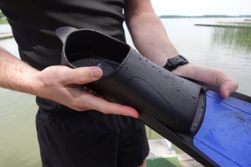 Oceanic Predator Closed Heel Foot Pocket Our tester holding the wet closed heel foot pocket of the Oceanic Predator freediving fin