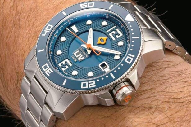 LIV GX Diver with blue wave-textured dial and steel bracelet worn on our reviewer's wrist