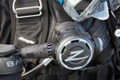 Zeagle F8 second stage and BCD still dripping after a dive, with a dive mask resting alongside