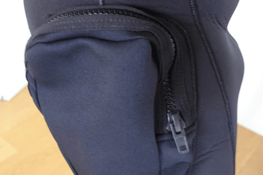Northern Diver Semi Dry Wetsuit Pocket Zipped pocket detail on the navy Northern Diver 7mm rear entry semi dry wetsuit