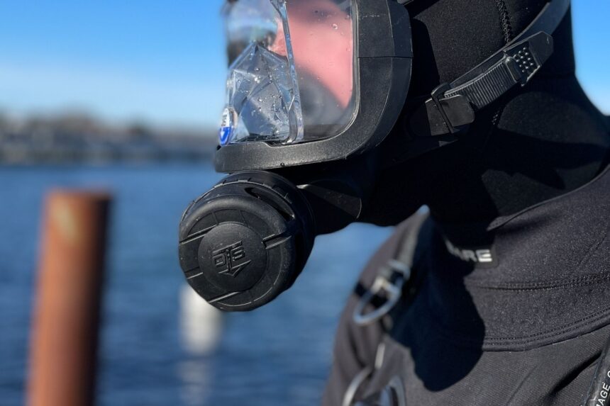 OTS Guardian Mask Side Profile Side view of the OTS Guardian full face mask worn by our tester, with the round port cover facing out