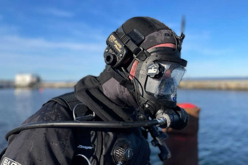 OTS Guardian Mask With Zeagle BCD Our tester dockside in the OTS Guardian mask with a BuddyPhone comms unit mounted and a Zeagle harness on