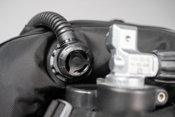 Close-up of the Zeagle Ranger corrugated inflator hose and power inflator beside the tank valve