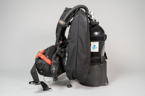 Zeagle Ranger BCD from the side with a cylinder mounted, showing the rear bladder and harness