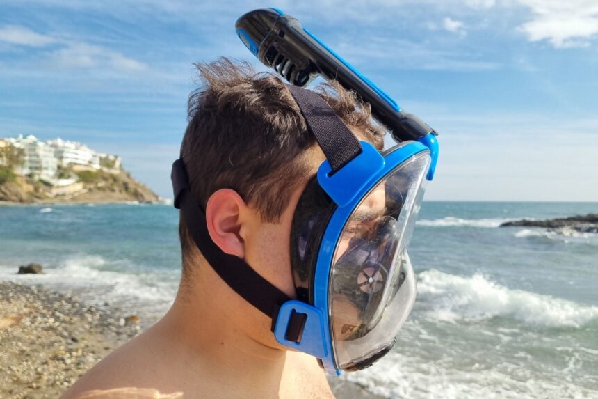 Cressi Duke Worn At The Shore Our tester wearing the blue Cressi Duke full face snorkel mask at the shoreline