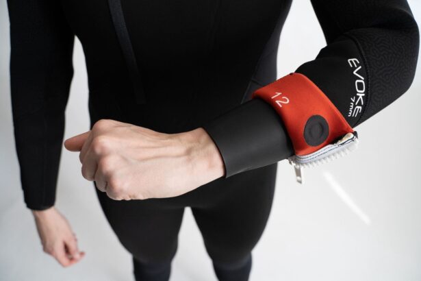 Sleeve cuff of the Bare Evoke 7mm folded back to reveal the red lining and wrist zipper
