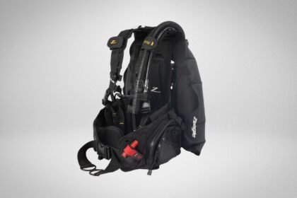 Zeagle Fury BCD seen from the side with its inflator hose and red ripcord weight release