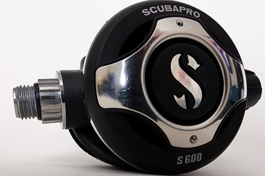 ScubaPro S600 second stage regulator on a white background, showing the chrome front cover and hose fitting