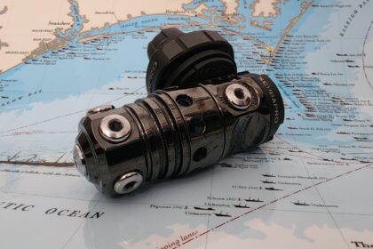 ScubaPro MK25 EVO first stage regulator resting on a nautical chart of the Atlantic coast