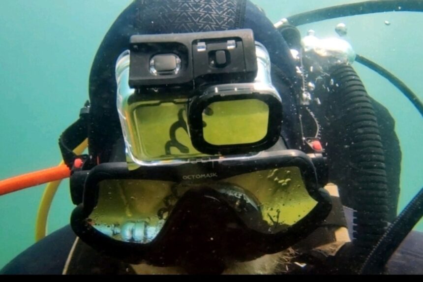 Our tester underwater wearing the Octomask with the GoPro housing sitting above the lens
