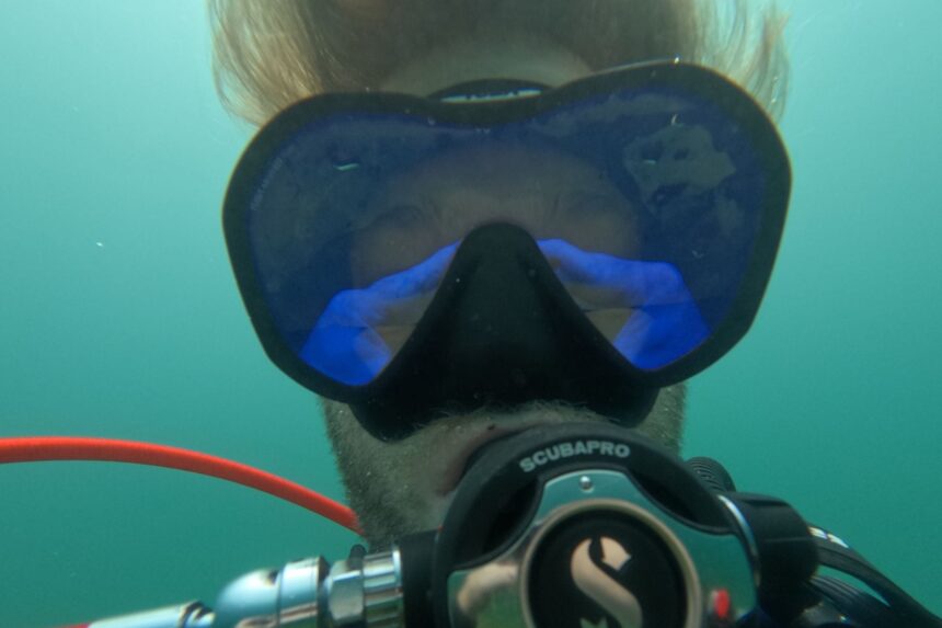 Our tester underwater in the TUSA Zensee Pro, its blue UV 420 lens hiding his eyes