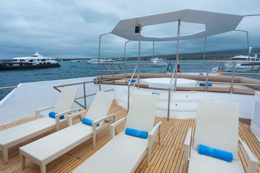 Aerial view of the Tiburon Explorer's upper deck loungers with boats anchored nearby