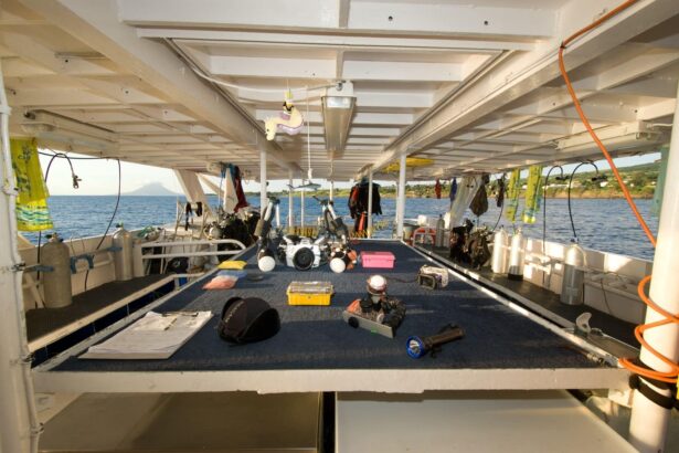 Camera and dive gear laid out on the photography table on deck