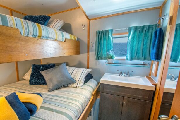 Twin bunk cabin with an ensuite bathroom aboard the Caribbean Explorer II