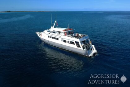 Bahamas Aggressor liveaboard yacht anchored near a shallow reef flat