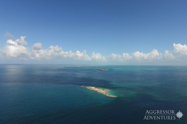 Aerial view of small cays scattered across turquoise Bahamas waters