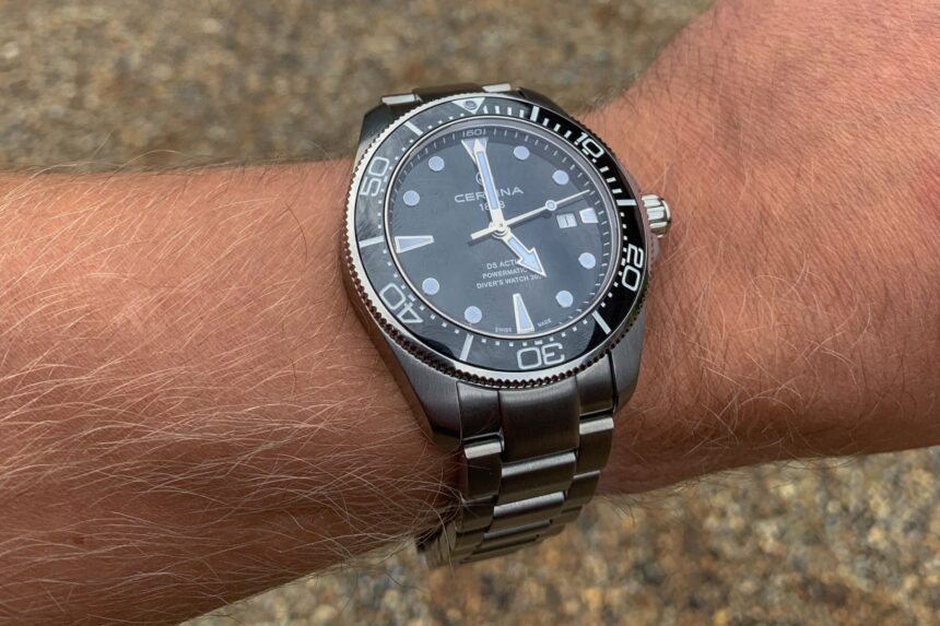 Certina DS Action Diver on its stainless steel bracelet, worn at an angle on a wrist