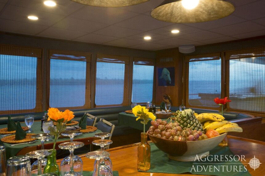 Evening dining salon set with fruit bowl aboard the Belize Aggressor IV