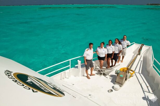 Belize Aggressor III crew posing together on the dive deck