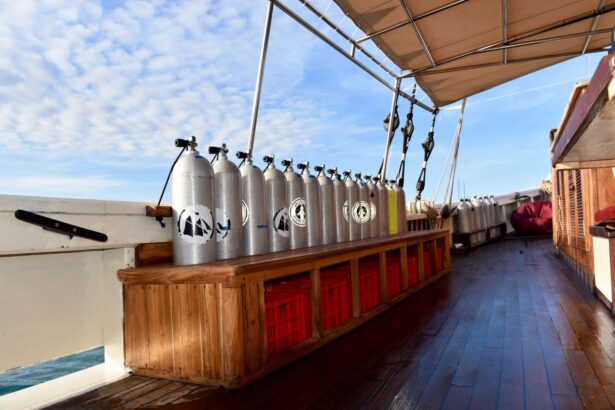 Row of scuba tanks lined up on the dive deck of the Emperor Raja Laut