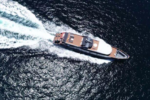Aerial view of the All Star Velocean cutting through open water