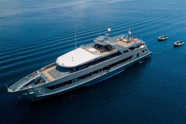 Aerial view of the All Star Velocean anchored with its tenders trailing behind