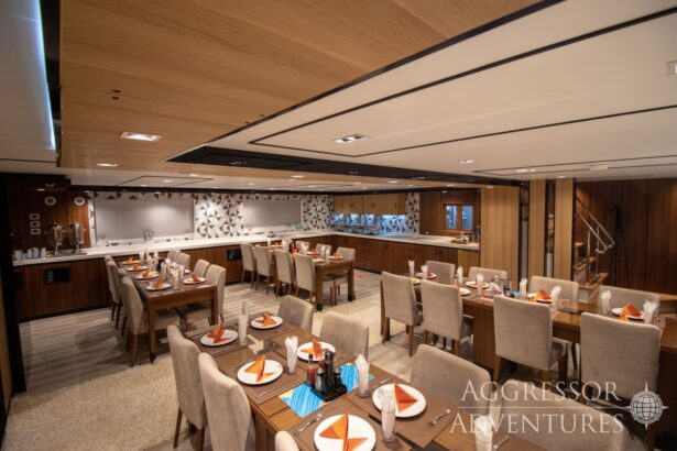 Dining room with wood ceiling and buffet counter set for a meal aboard the Red Sea Aggressor IV