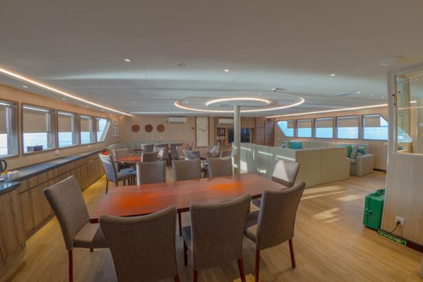 Dining table set with chairs in the Gaia Love indoor dining area