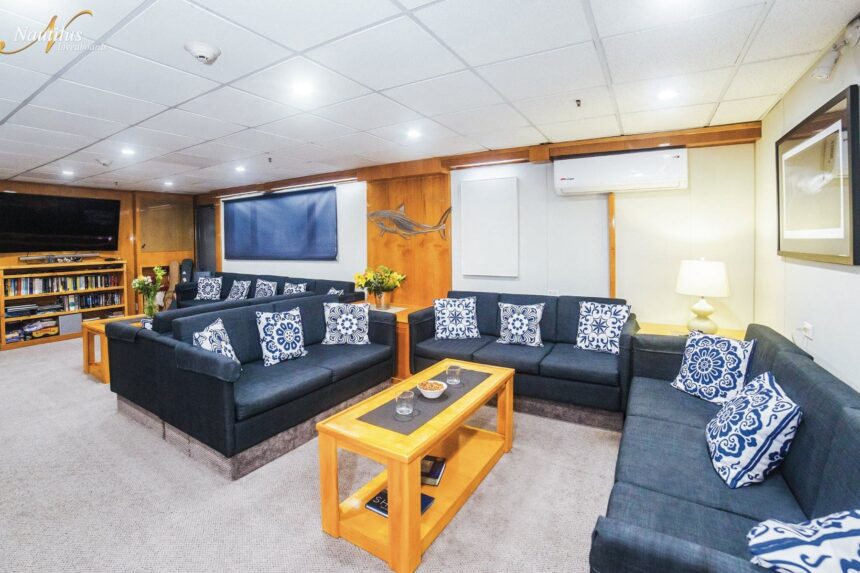 Cozy lounge salon with sofas aboard the Nautilus Belle Amie