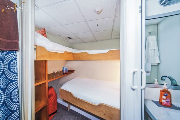 Bunk beds and ensuite bathroom in a Nautilus Belle Amie cabin