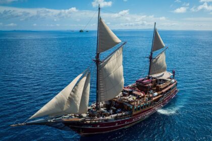 Arenui traditional phinisi schooner under full sail on open water