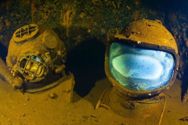 Two vintage diving helmets resting among the wreckage in Truk Lagoon