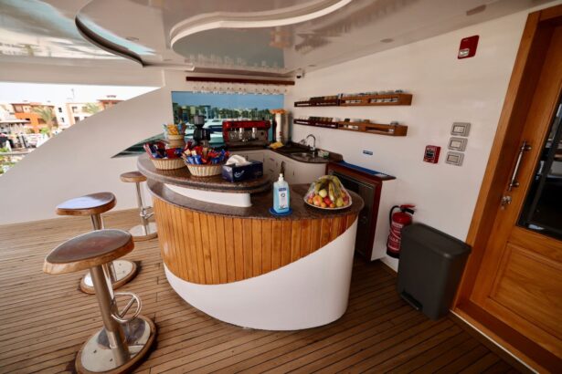 outdoor bar counter stocked with snacks, fruit and hand sanitizer on the sundeck