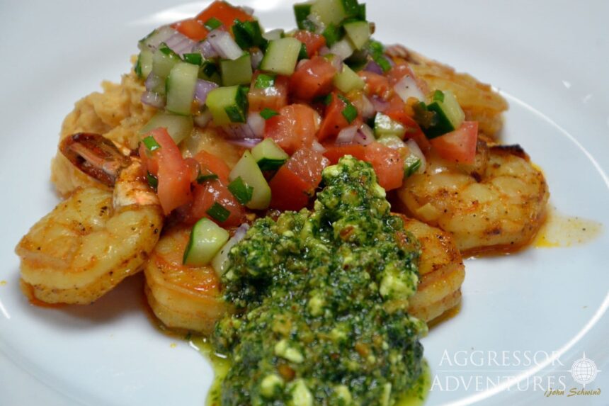 Grilled shrimp plated with fresh salsa and pesto aboard the Palau Aggressor II