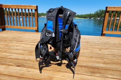 Mares Prestige SLS jacket-style BCD standing on a wooden dock at DIVEIN's quarry test site