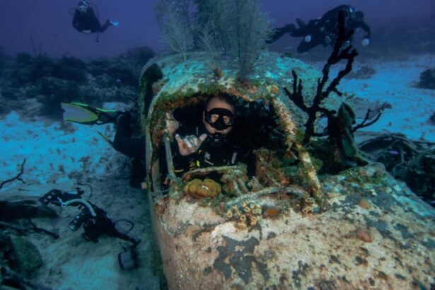 Diver giving a shaka sign inside a sunken plane wreck
