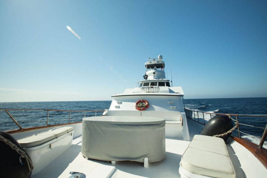 Sun deck with a covered hot tub aboard the Nautilus Gallant Lady