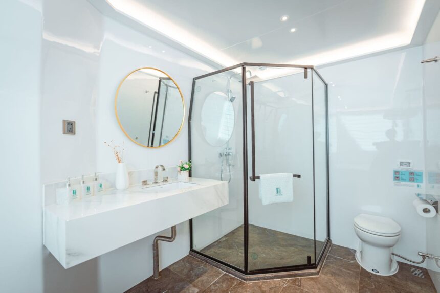 Marble ensuite bathroom with glass shower stall aboard the M/Y White Pearl
