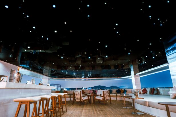 Rooftop bar deck on the White Pearl under a starlit ceiling canopy at dusk