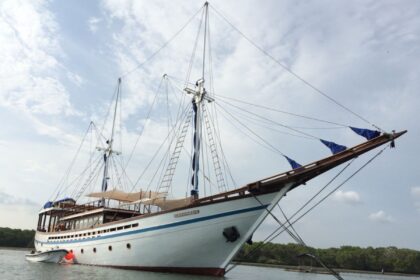 Samambaia liveaboard yacht viewed from above with a sun deck and lounge seating on top
