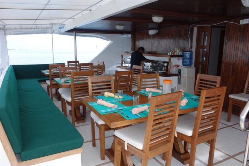 The Emperor Voyager liveaboard at sunset with calm seas