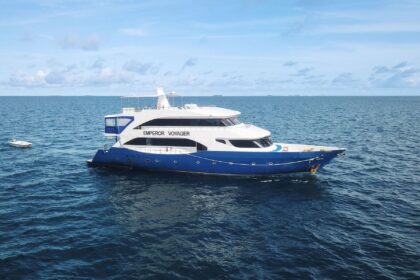 Emperor Voyager liveaboard dive yacht anchored in open blue water