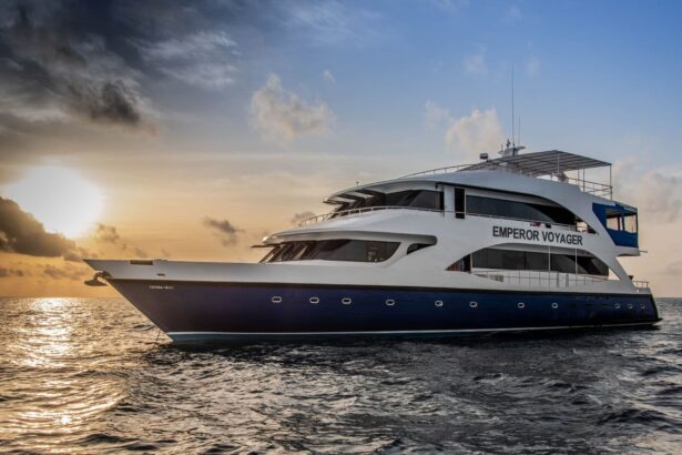 The Emperor Voyager liveaboard cruising under a blue sky