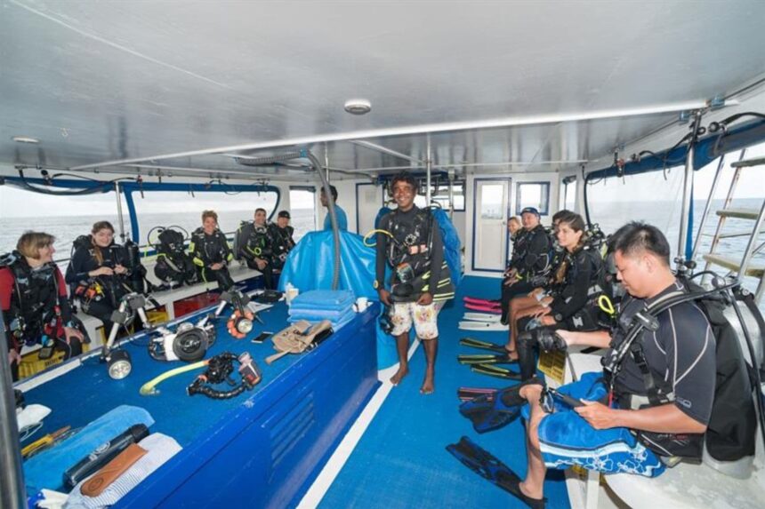 A comfortable lounge aboard the Emperor Virgo with sofas and a flatscreen TV