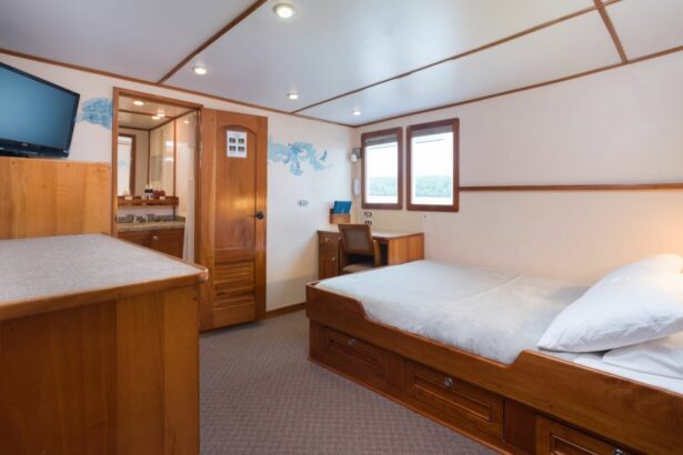 An open cabin door reveals a made-up bunk bed aboard the Sea Hunter